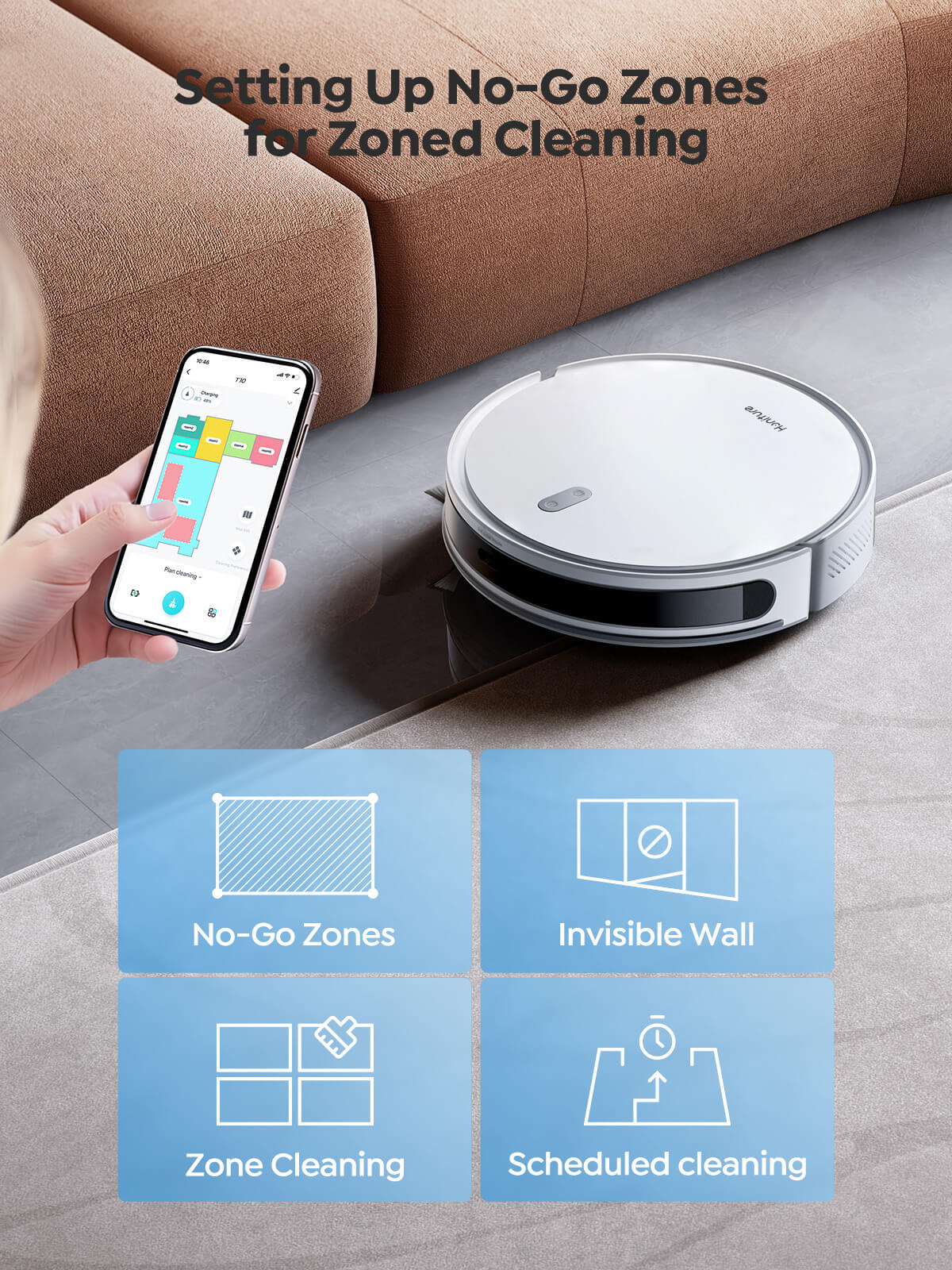 Robot vacuum near sofa with smartphone app controlling cleaning zones.