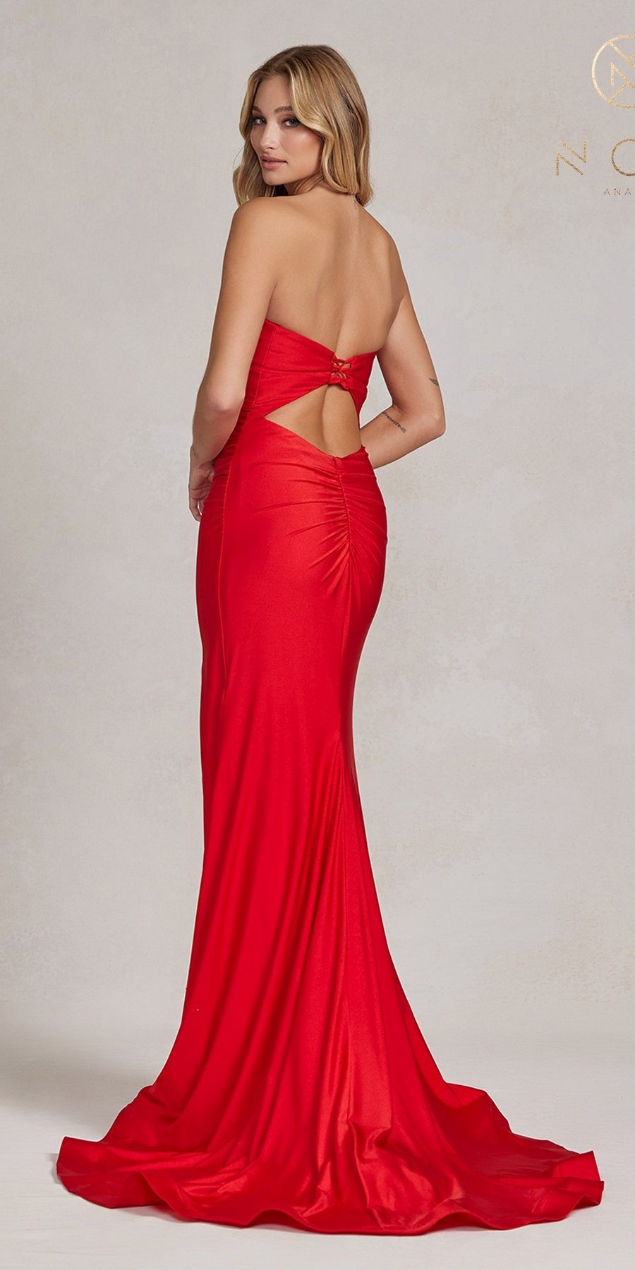 Red strapless satin sweetheart dress with open back cutout, fitted floor-length