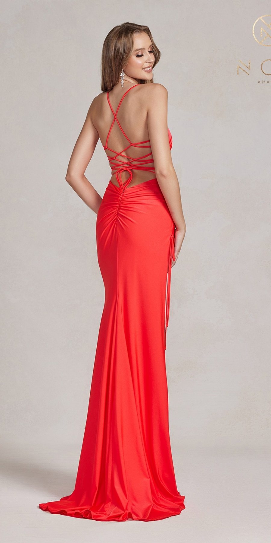 Red long ruched sheath dress with open strappy back and high leg slit, rear angle