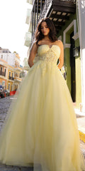 Strapless A-line tulle gown with glitter bodice, pale yellow, full-length flowing skirt