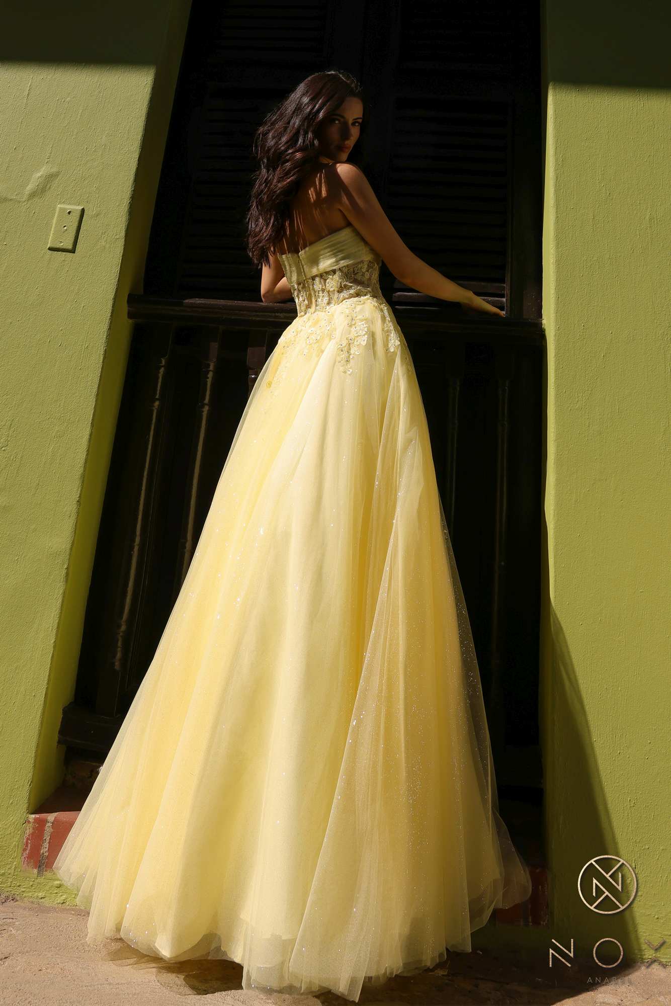 Strapless A-line tulle gown, pale yellow, sheer back and full flowing skirt