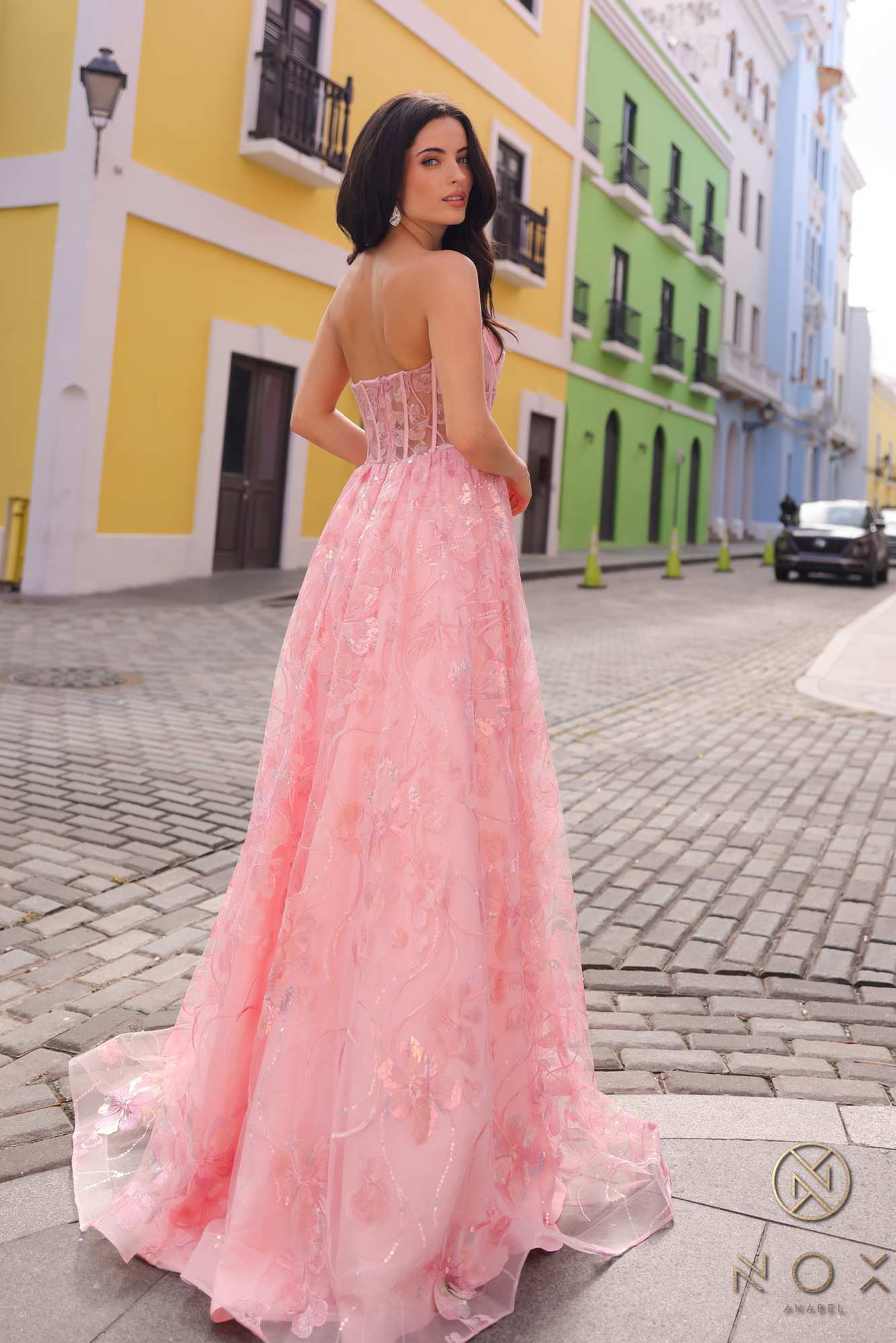 Blush strapless A-line sequin floral gown with fitted corset bodice and layered skirt