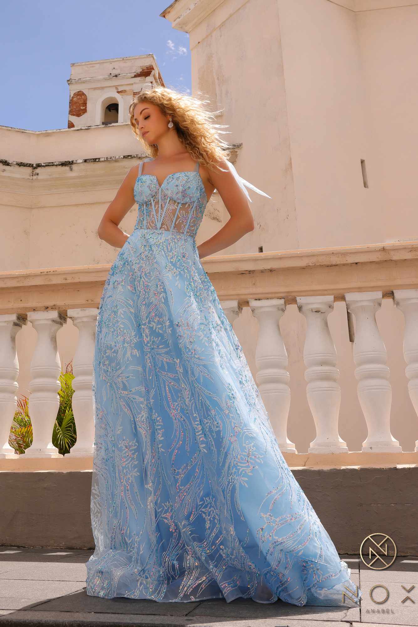 Light blue sequin corset ball gown, back/side view with long A-line skirt