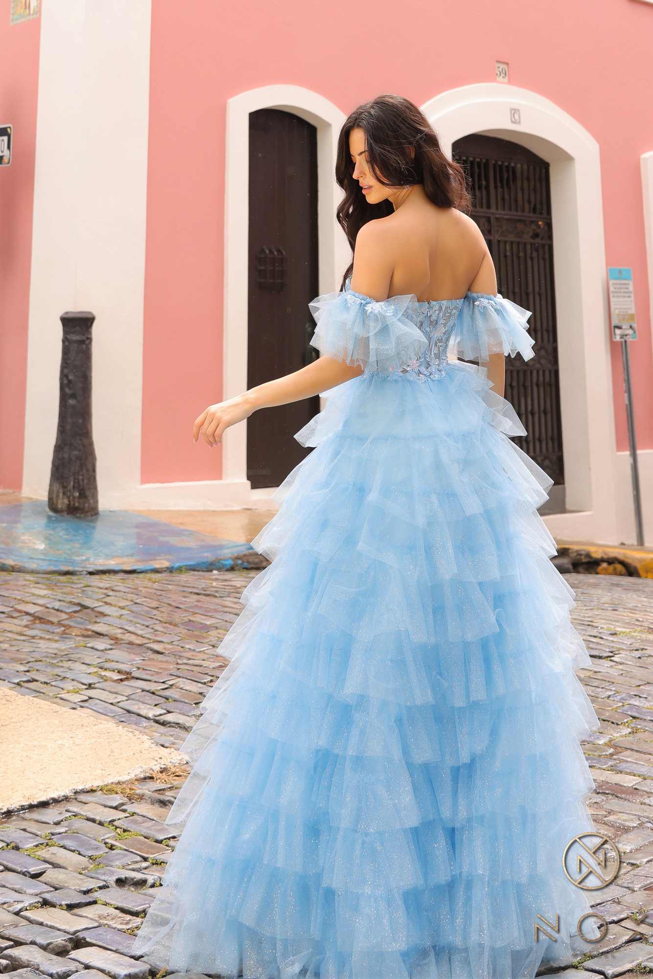 Light blue long ruffled tiered A-line ball gown with open-back off-shoulder bodice