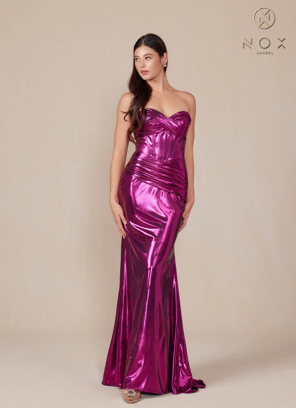 Magenta strapless metallic satin fitted gown with draped ruching at waist