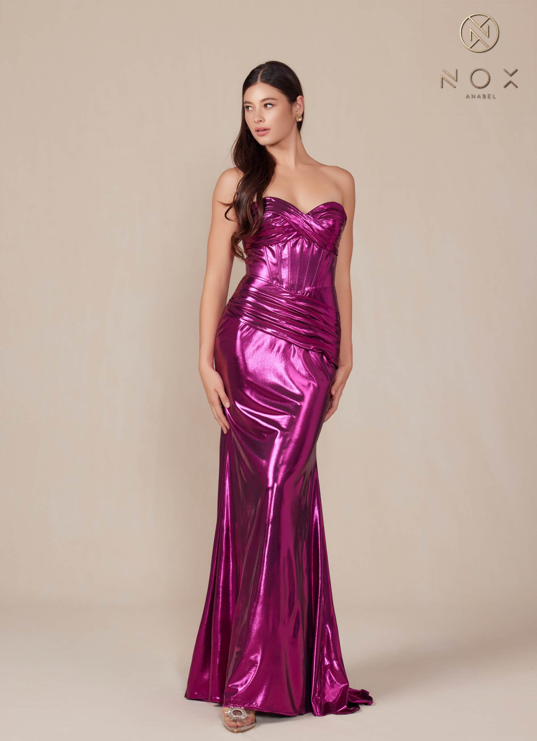 Magenta strapless metallic satin fitted gown with draped ruching at waist