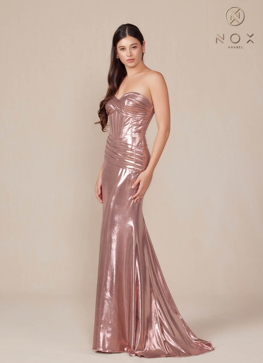 Rosegold metallic satin strapless fitted gown with gathered bodice and floor-length skirt