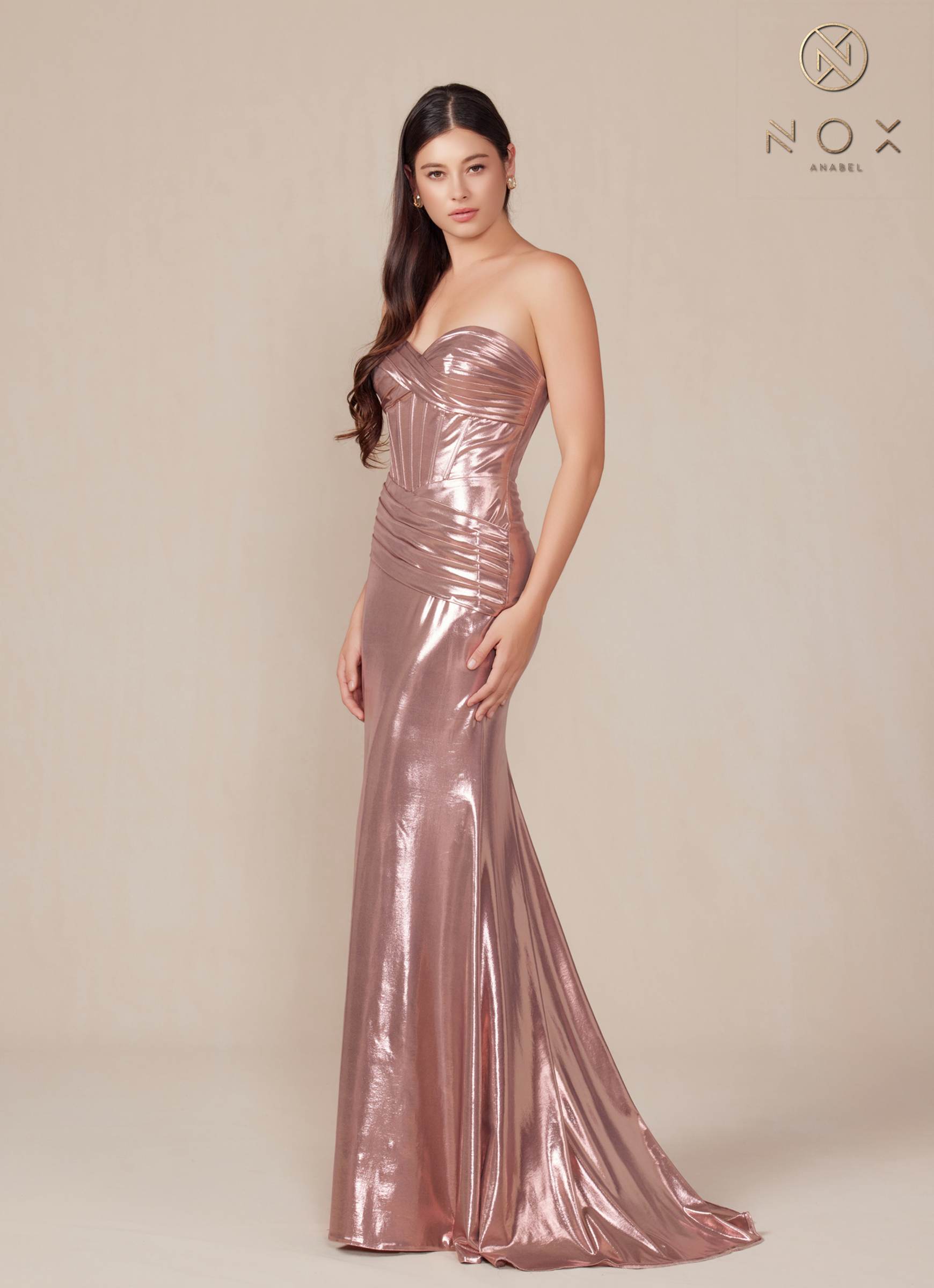 Rosegold metallic satin strapless fitted gown with gathered bodice and floor-length skirt