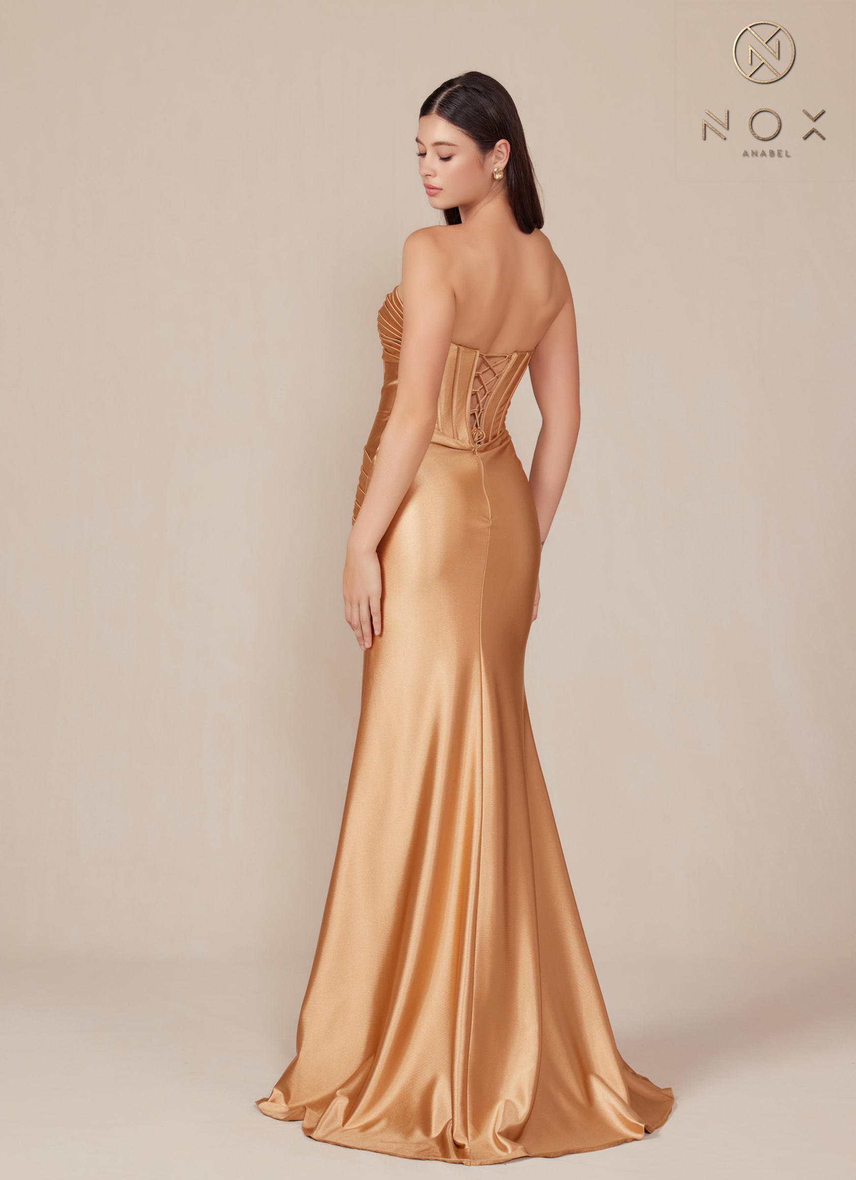 Satin strapless floor-length dress in gold, back view with corset-style laced detail