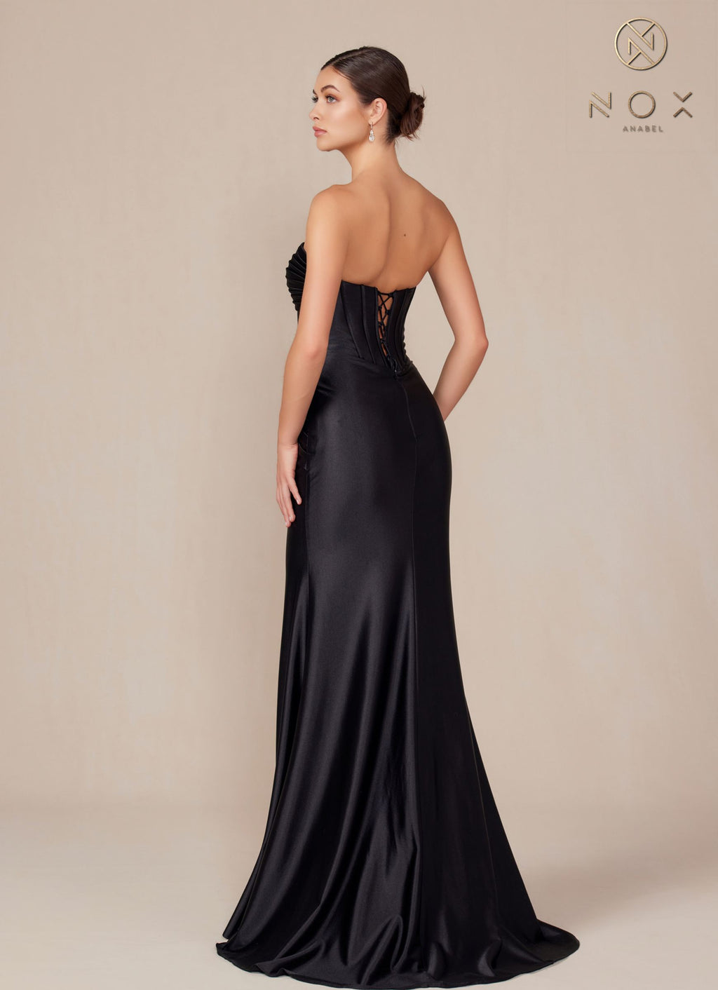 Satin strapless floor-length dress in black, back view with ruched corset detailing