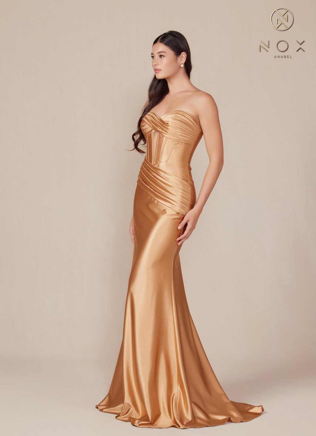 Satin strapless floor-length dress in gold with ruched corset-style bodice and draped hem