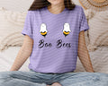Purple graphic tee with ghost bee icons and 'Boo Bees' text on front.