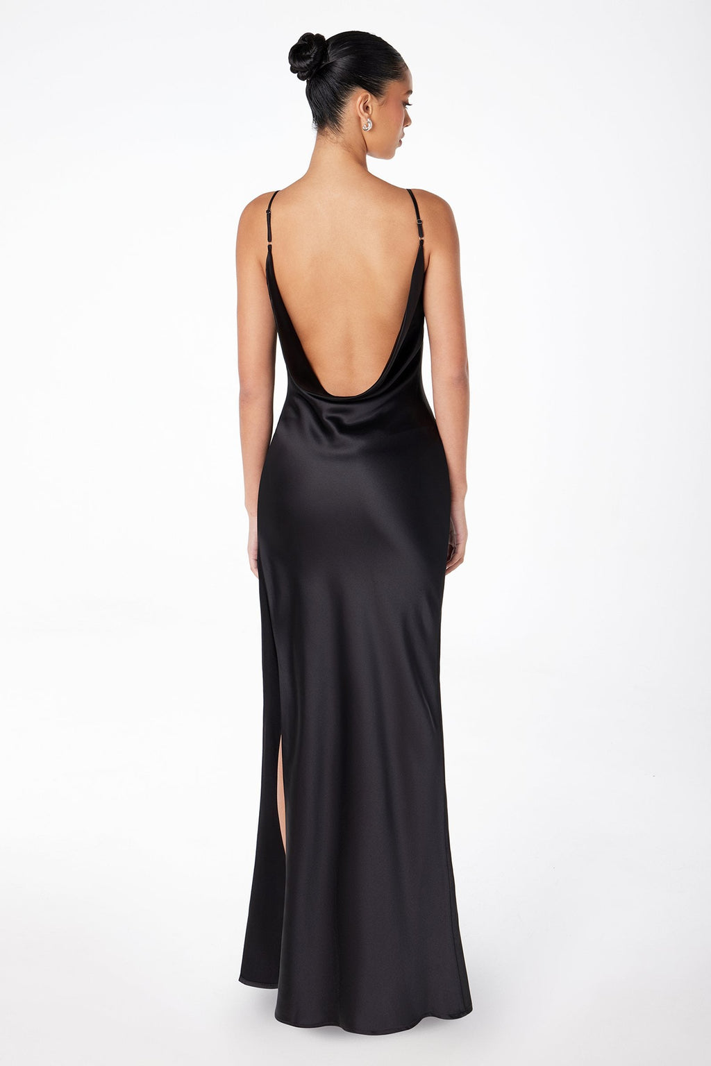 Sleeveless open-back satin gown in dark black, low square back, floor-length column.