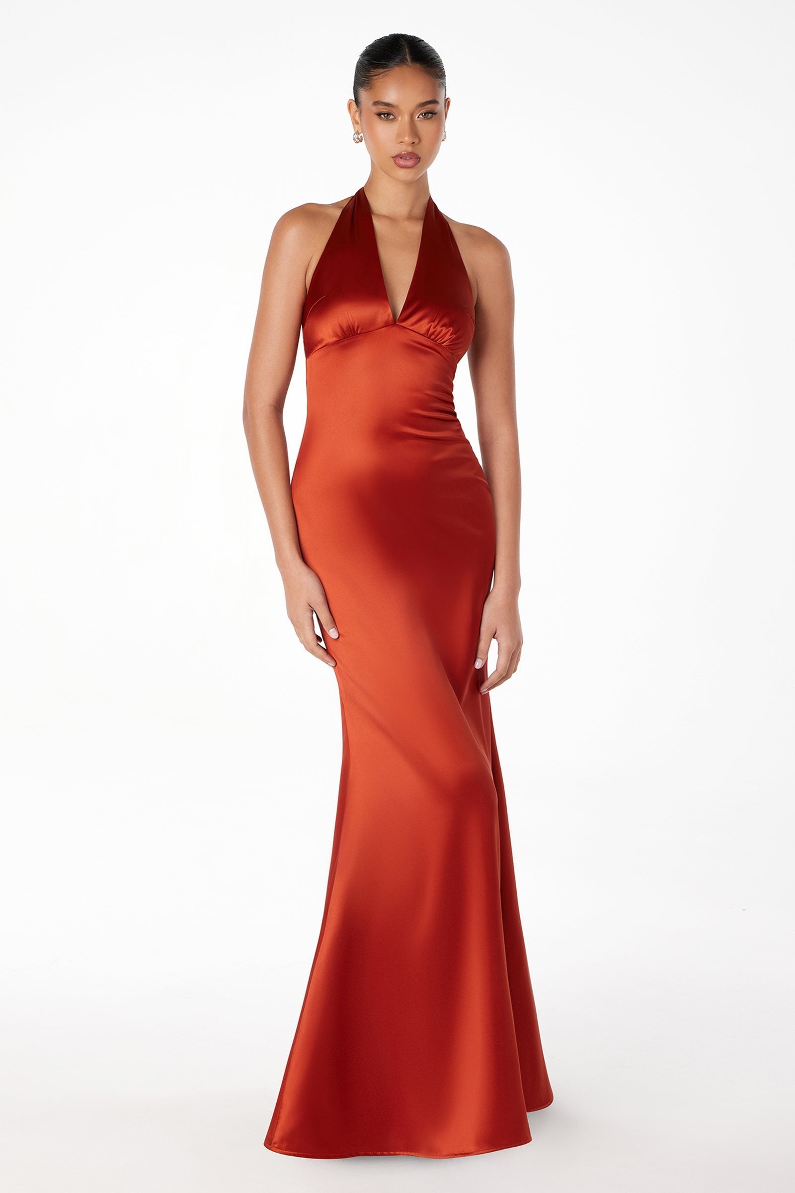Red satin halter evening gown with long V-neckline and fitted column skirt