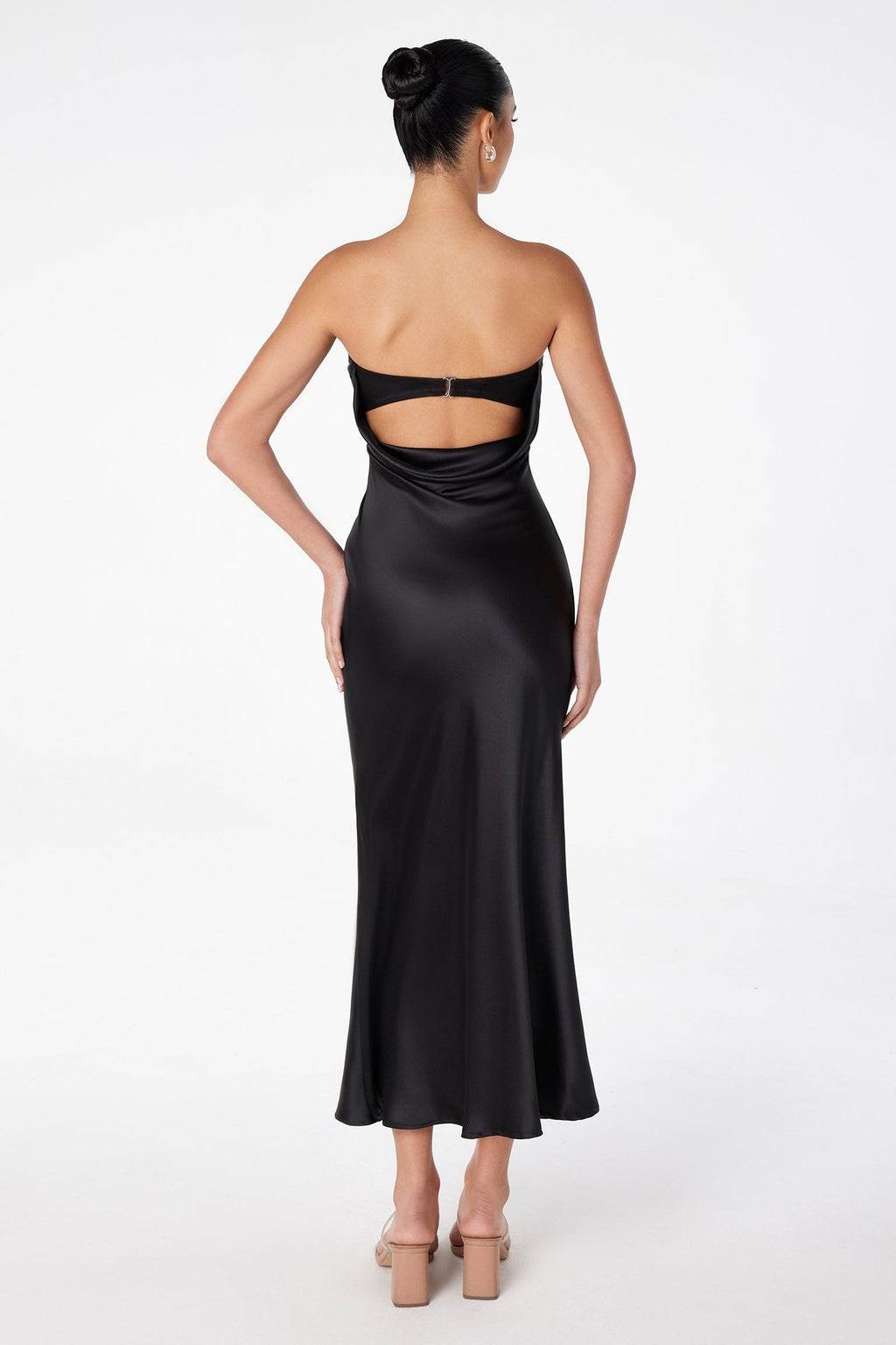 Black satin tea-length dress with strapless front and open back cutout