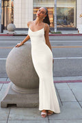 Off-white fitted spaghetti strap gown with V-neck and long column silhouette
