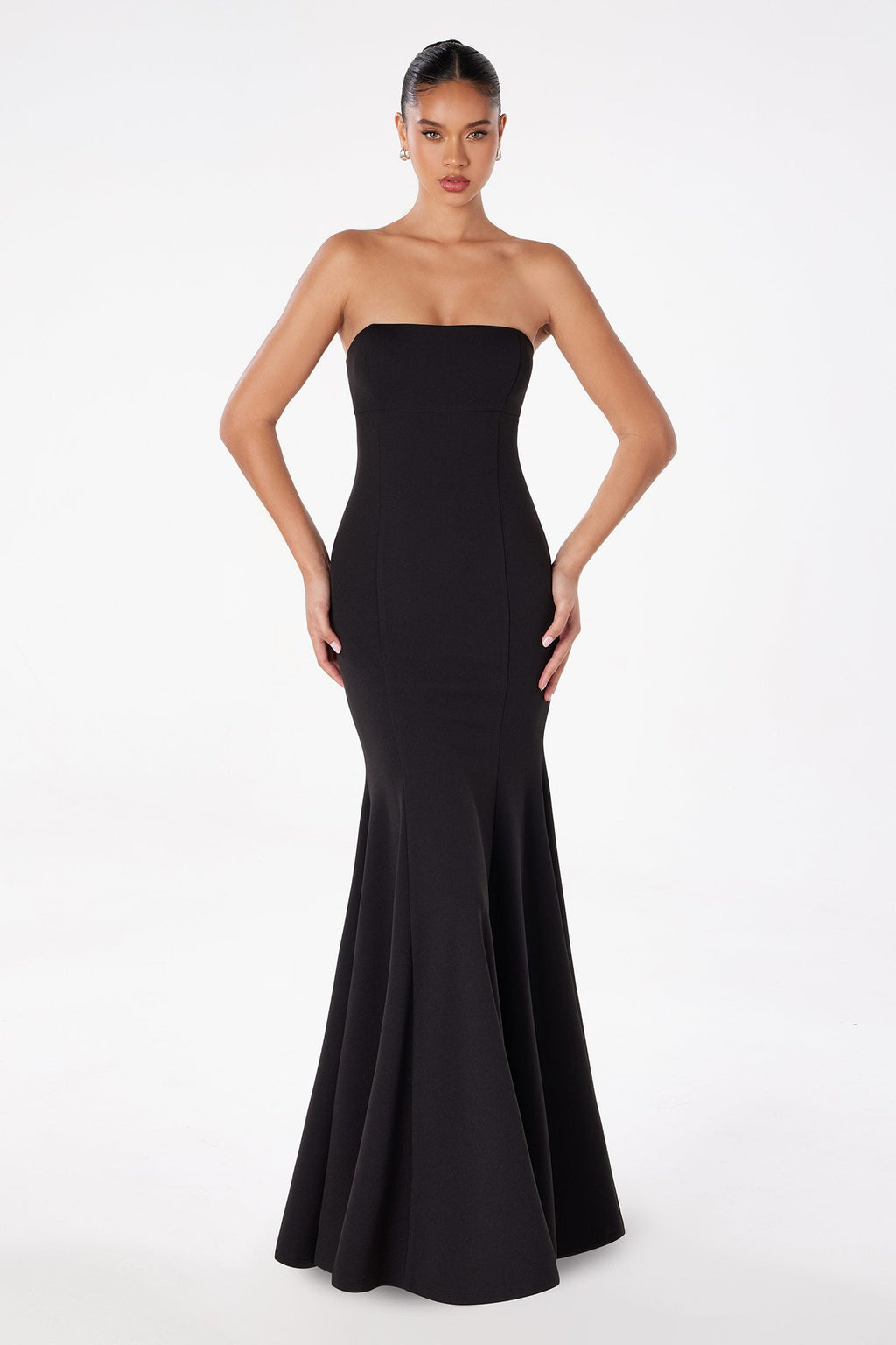 Black strapless fitted mermaid gown with straight neckline and flared hem