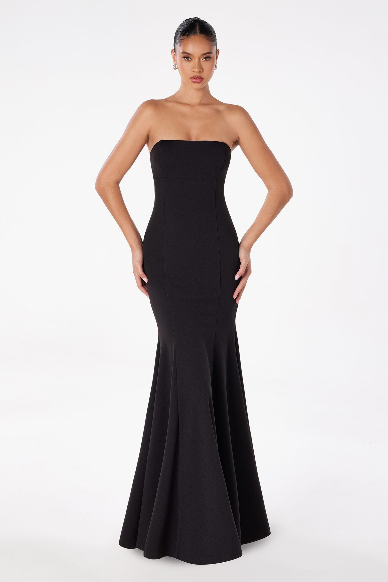 Black strapless fitted mermaid gown with straight neckline and flared hem