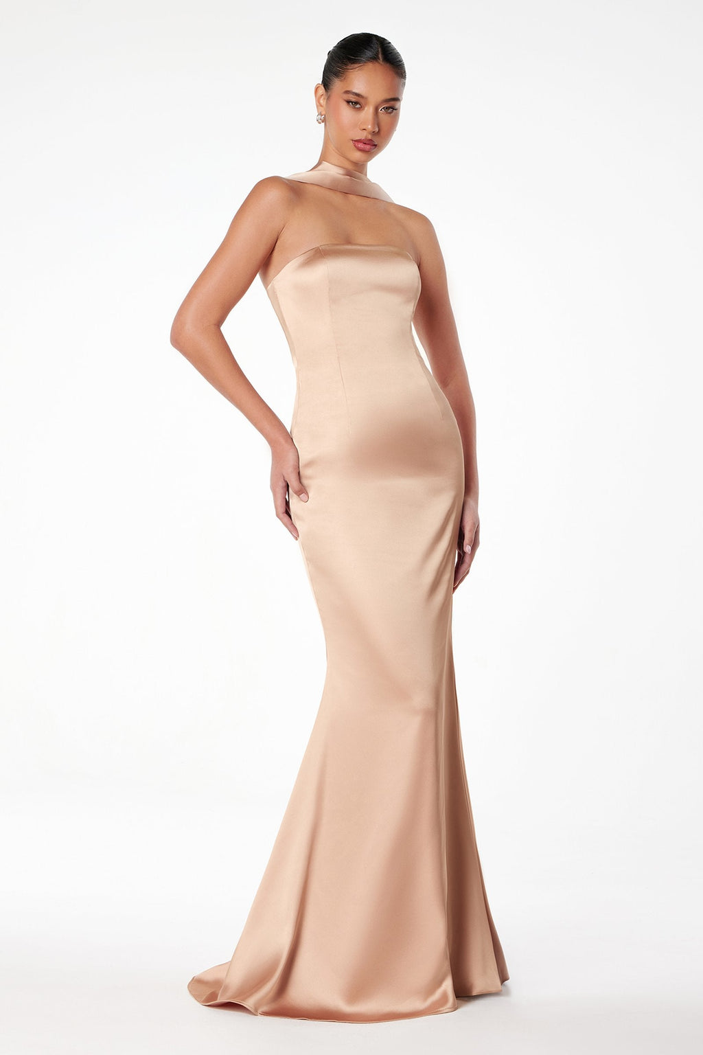 Pale gold strapless fitted mermaid gown with smooth satin look and flared hem