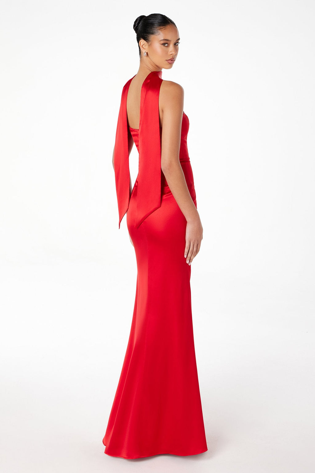 Strapless fitted mermaid gown in red with long scarf drape at the back