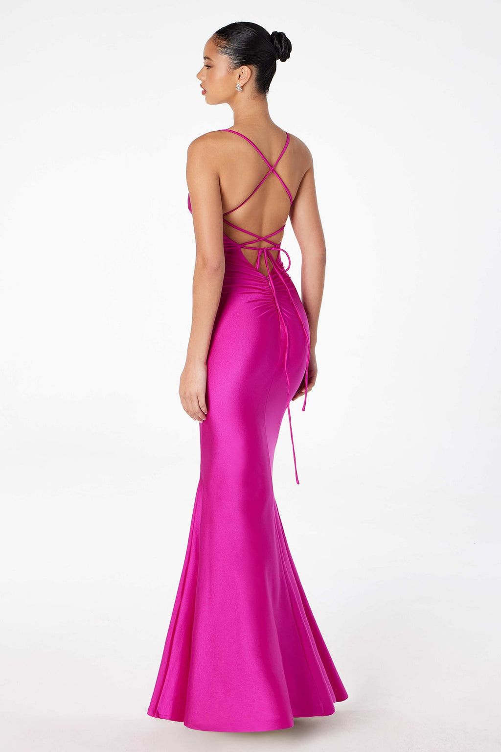 Magenta long fitted evening gown with open back crisscross lacing and flared mermaid hem