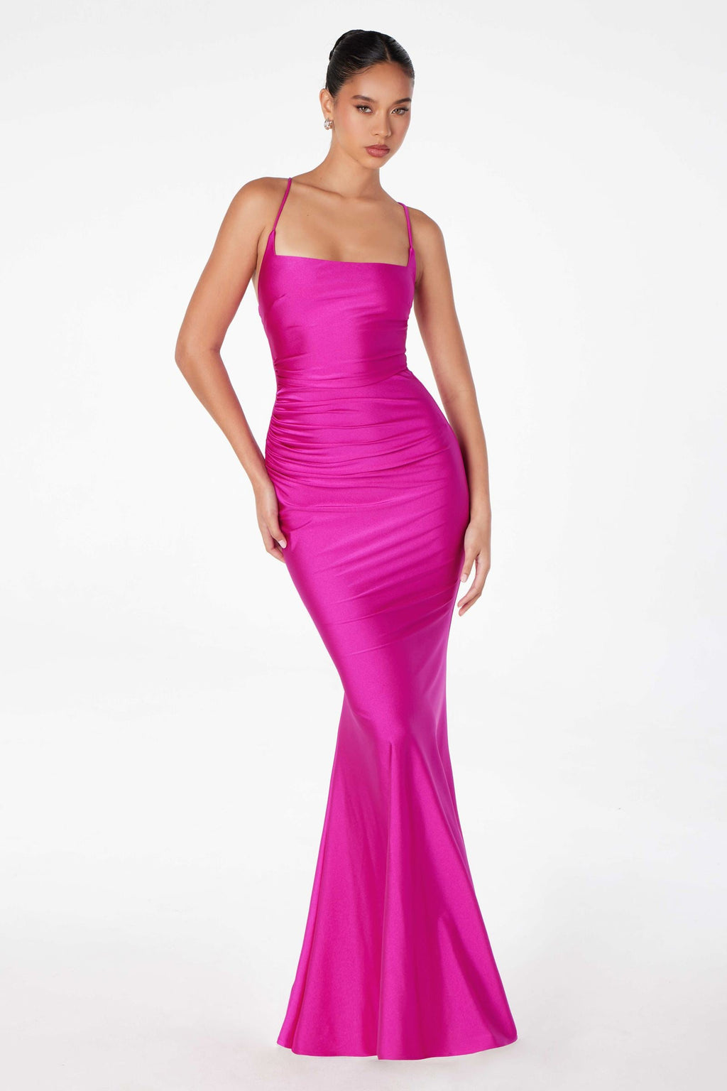Magenta long fitted evening gown with thin straps and ruched sides, mermaid hem