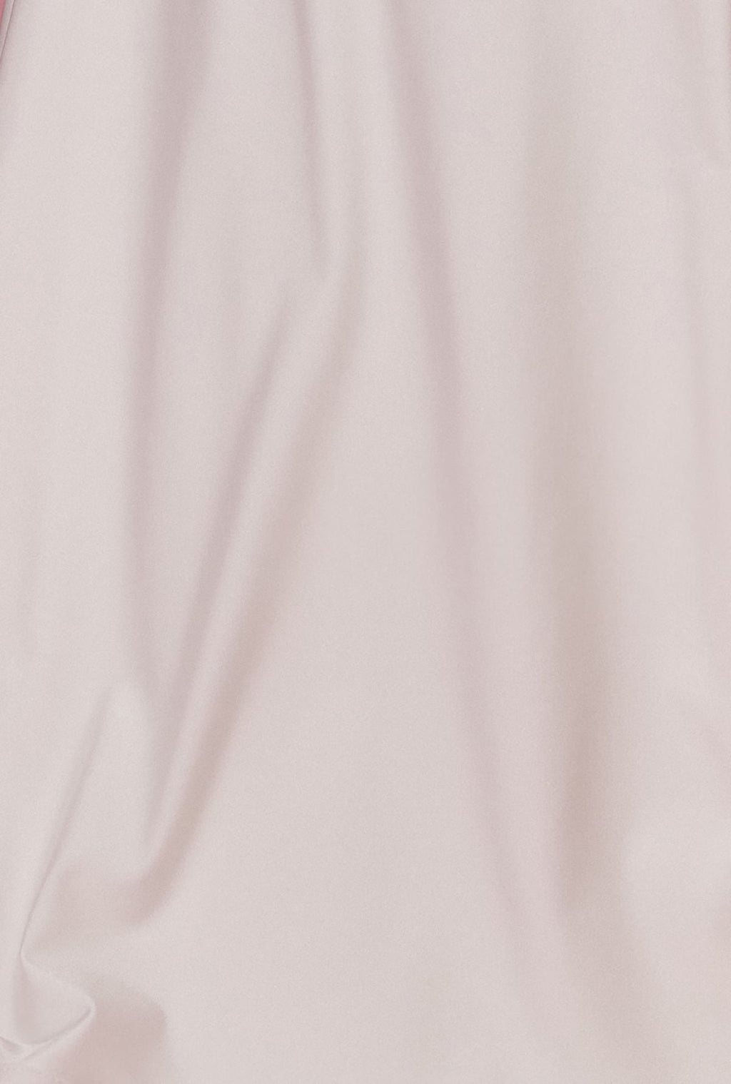 White gown fabric with smooth drape and stitched seam detail