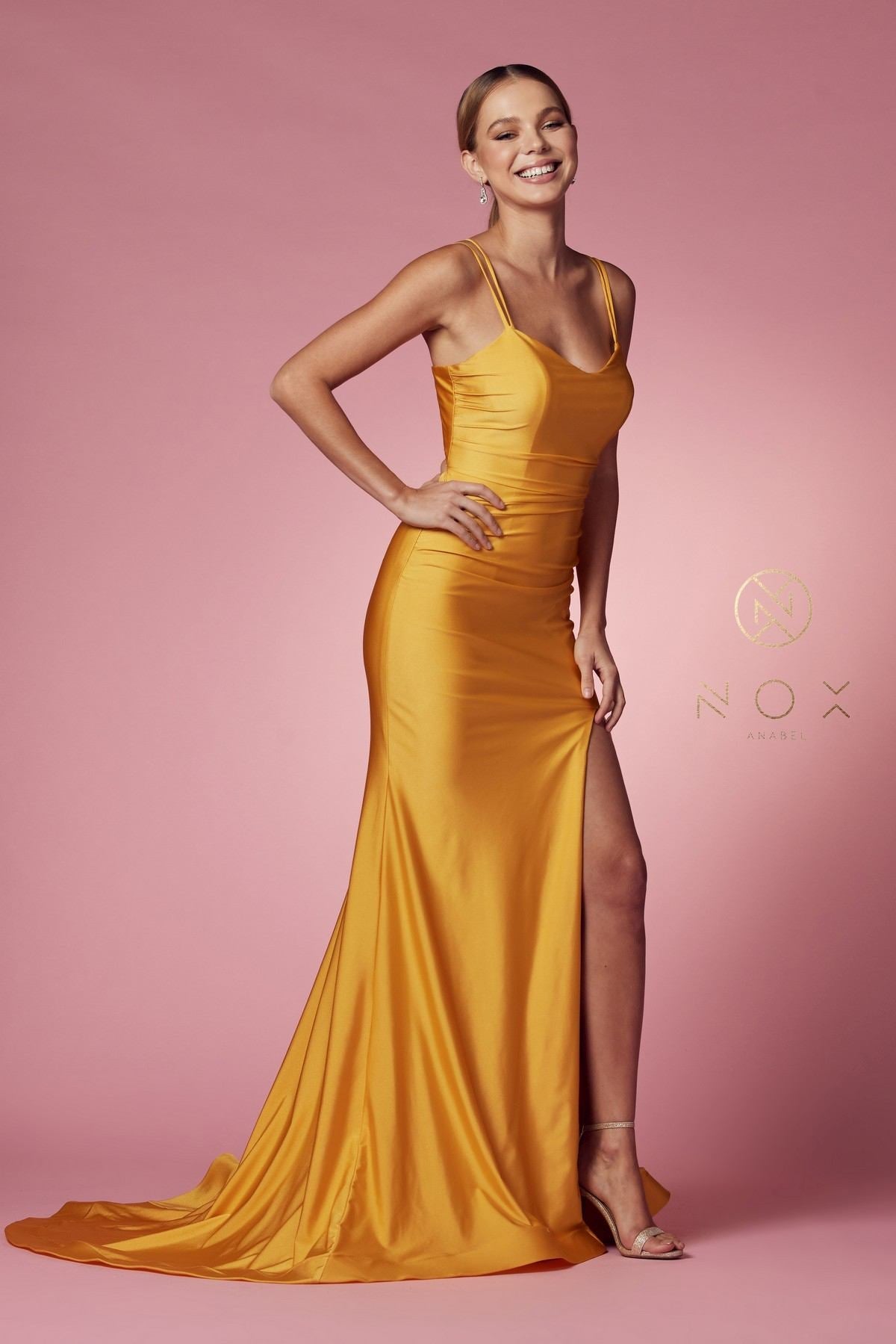 Gold long fitted scoop-neck spaghetti-strap gown with side slit