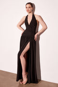 Black halter V-neck evening gown with ruched waist and dramatic high leg slit
