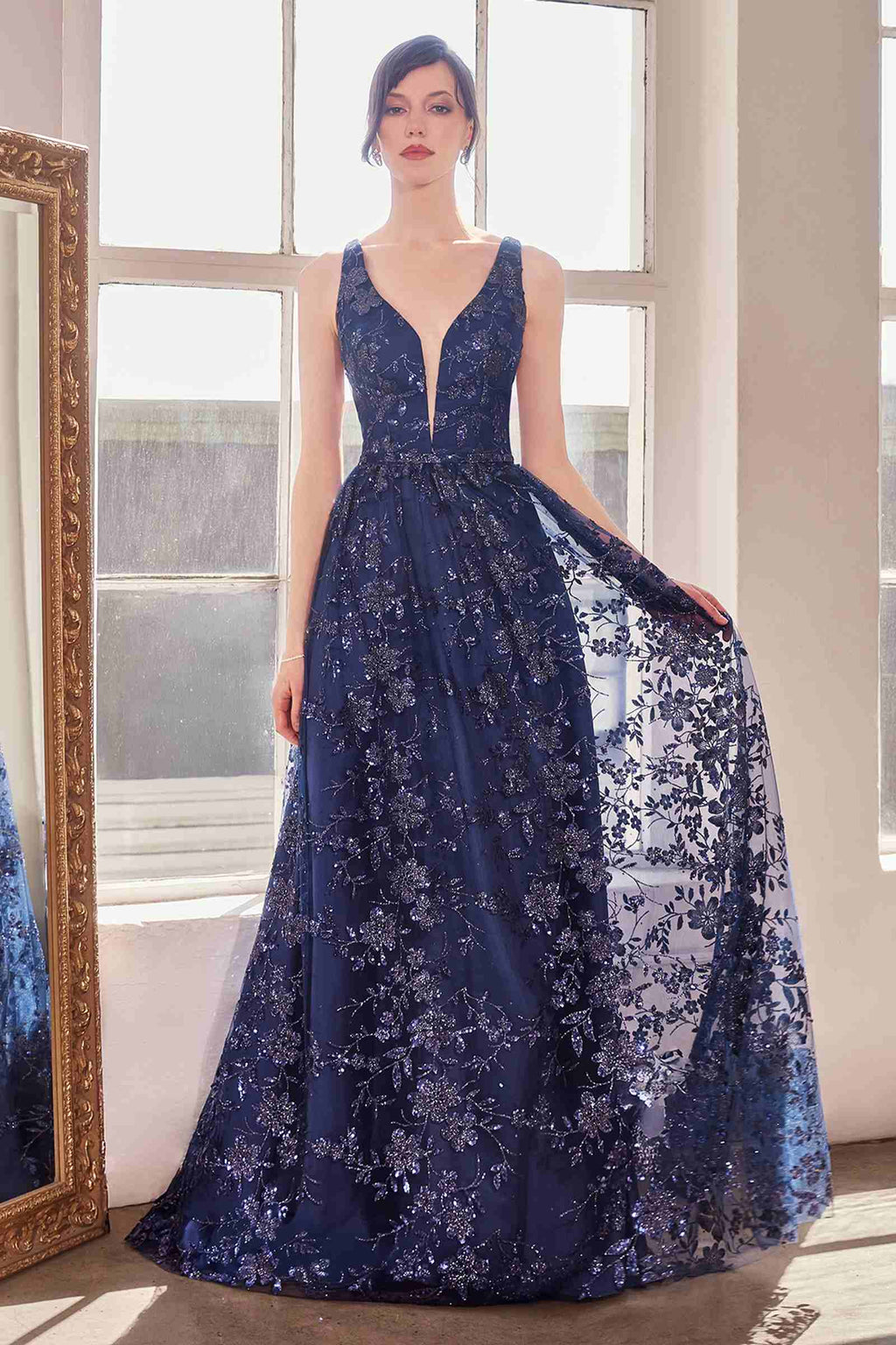 Navy sleeveless A-line gown with V-neck and shimmering floral glitter print, full skirt