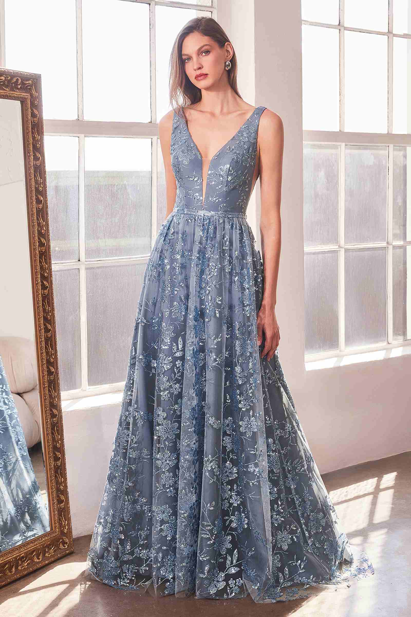 Blue sleeveless A-line gown with V-neck and sparkling floral glitter print, fitted waist