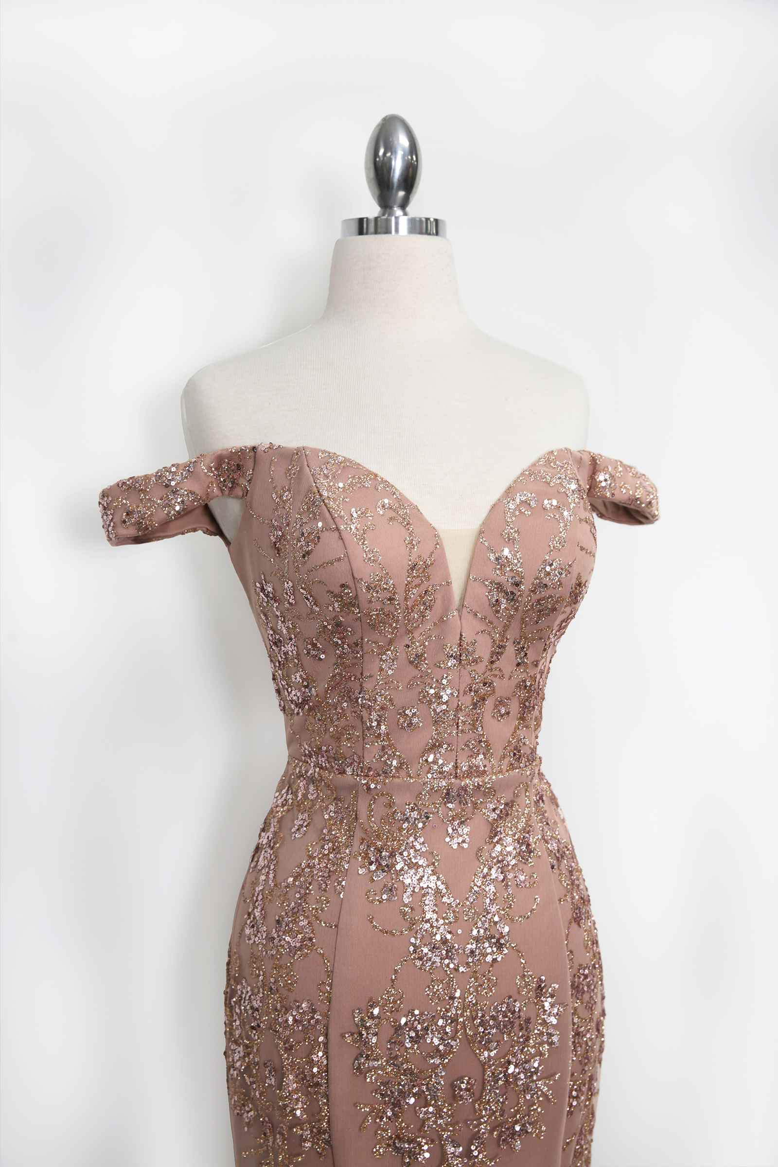 Rose gold off-shoulder sequin lace fitted gown back view on mannequin