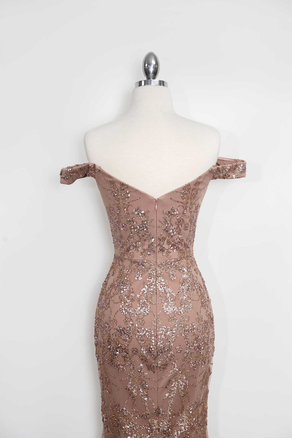 Rose gold off-shoulder sequin lace fitted gown back view on mannequin