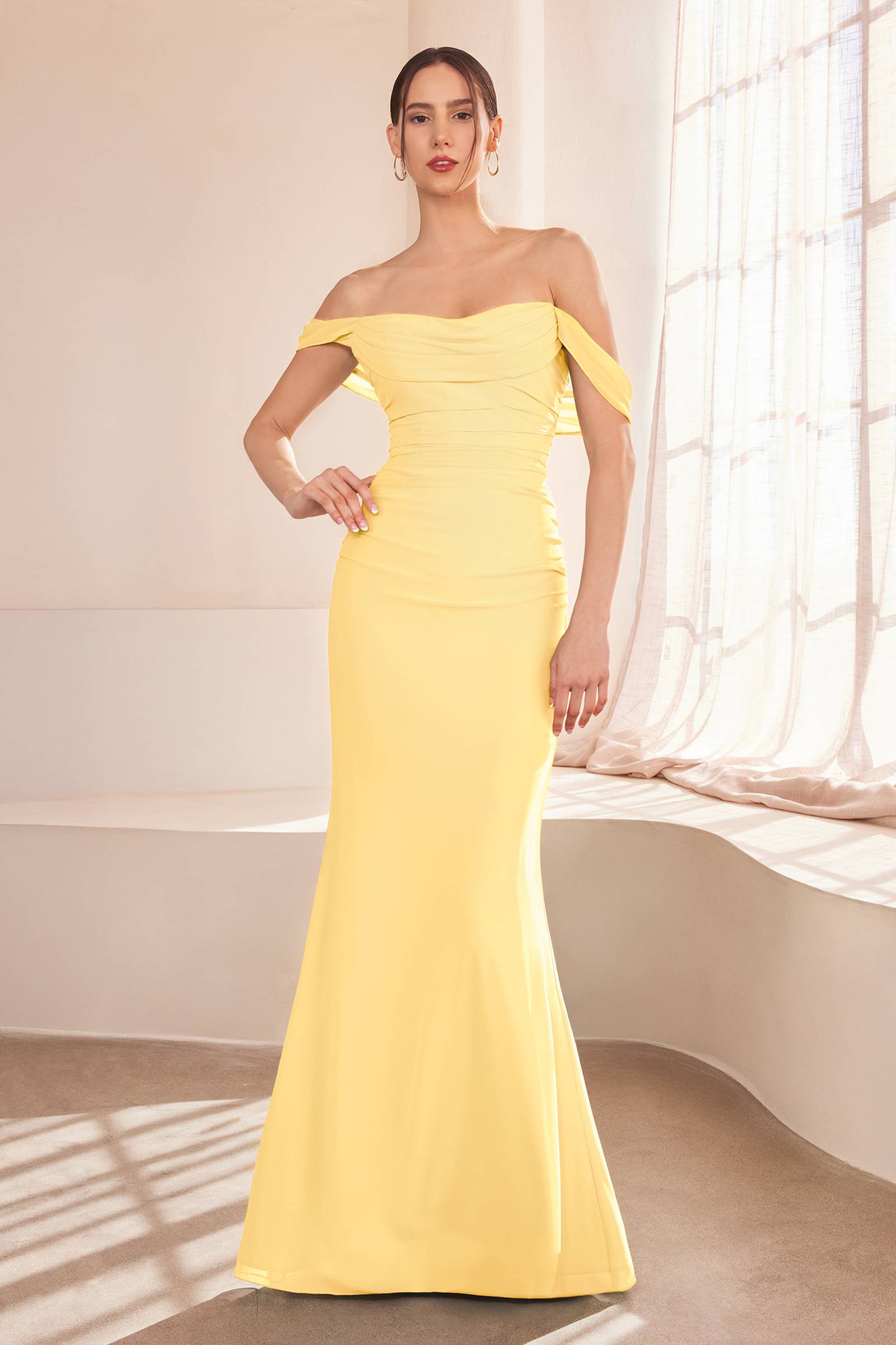 Yellow off-shoulder fitted bridesmaid gown with ruched bodice and long mermaid skirt