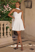 Off-white strapless chiffon dress with sweetheart neckline and pleated skirt