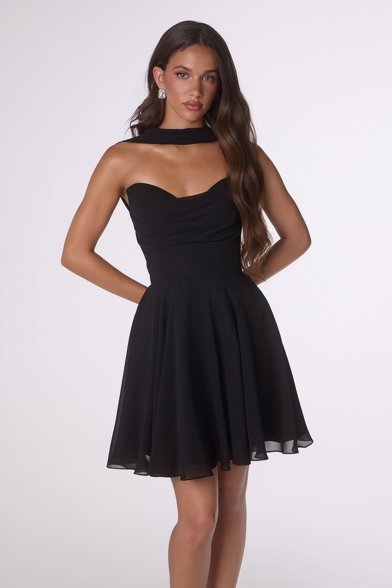 Strapless chiffon dress in black with fitted bodice and pleated flared skirt