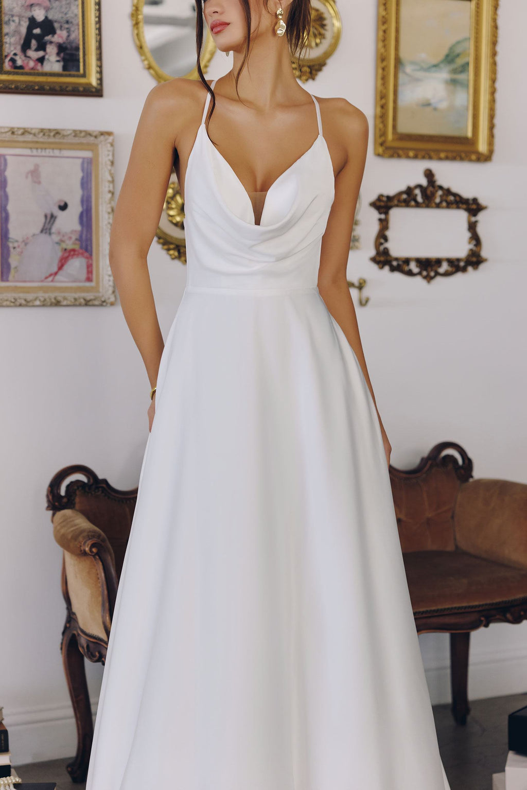 Off-white wedding dress bodice with thin spaghetti straps and V-shaped neckline