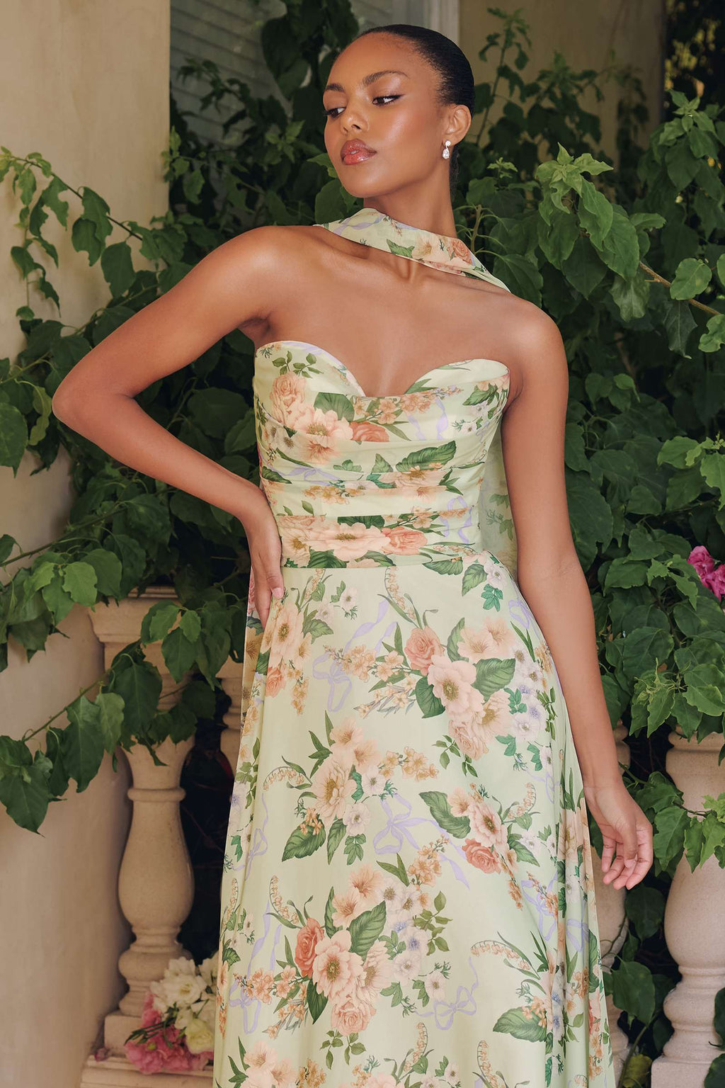 Floral chiffon A-line gown with corset back, strapless neckline, sage green floral