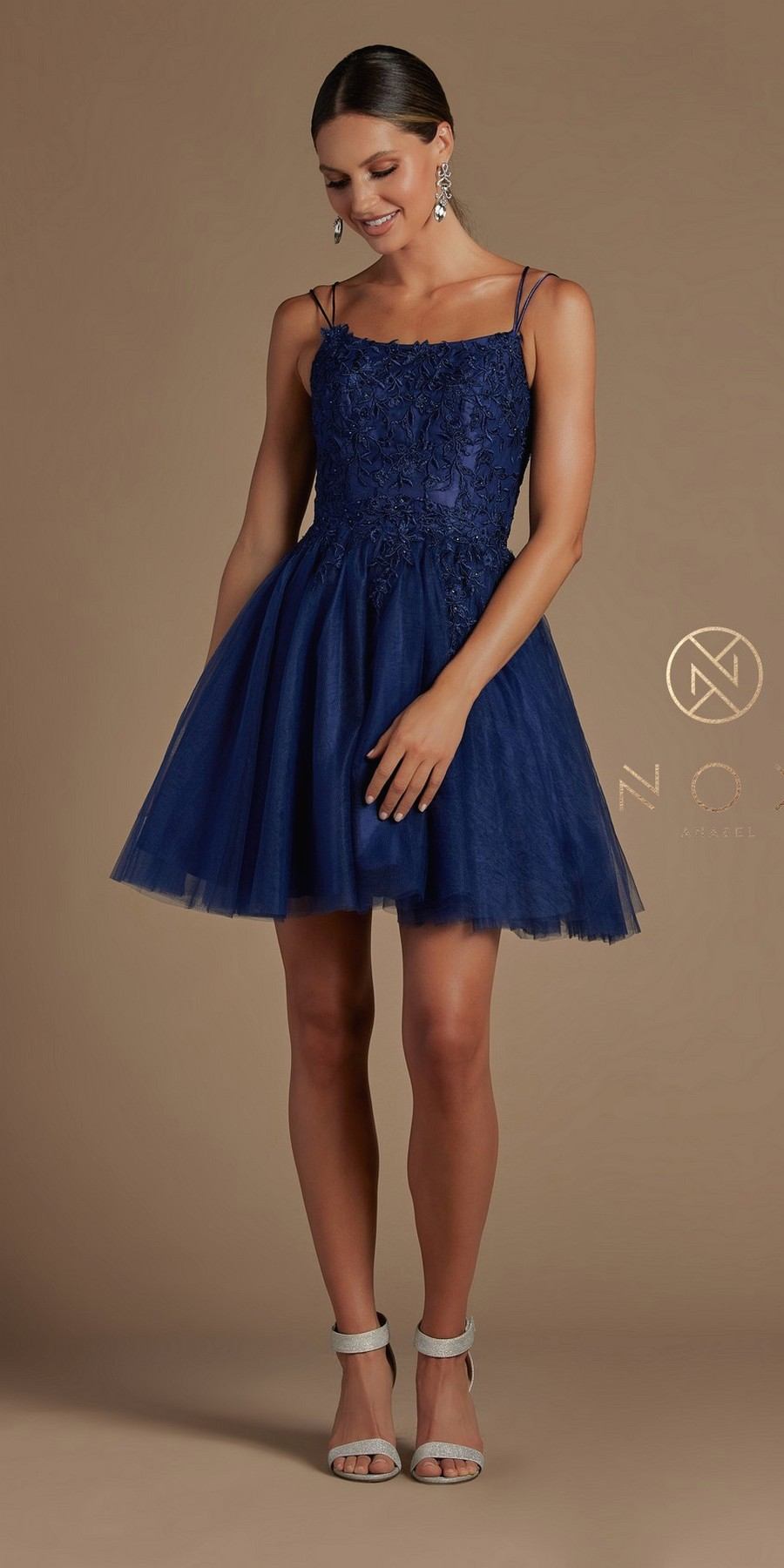A-line corset-back baby doll dress in dark blue with spaghetti straps and tulle skirt
