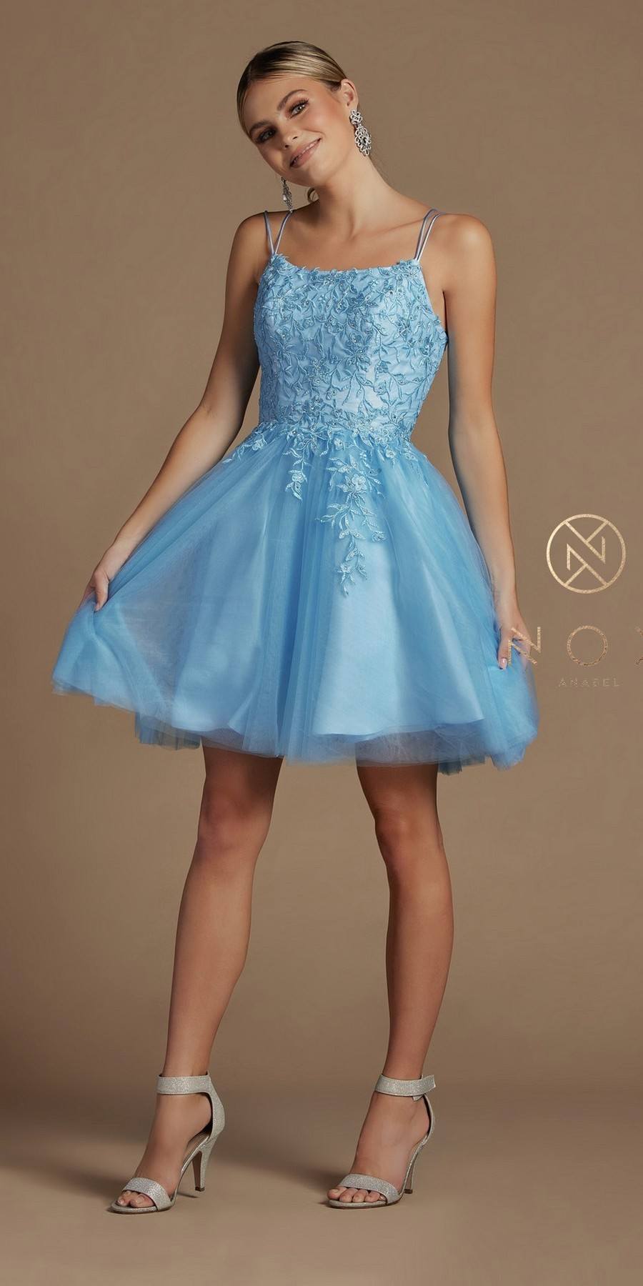 A-line corset-back baby doll dress in light blue with lace detailing and layered tulle skirt