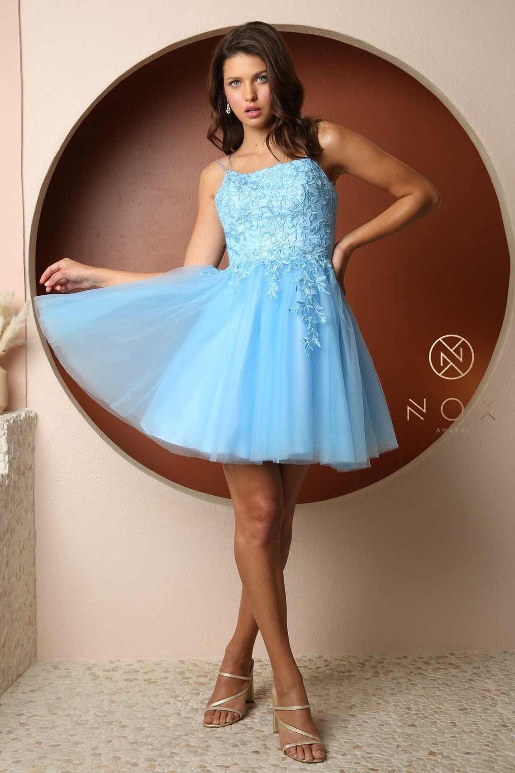 Light blue A-line baby doll dress with lace bodice and flared tulle skirt
