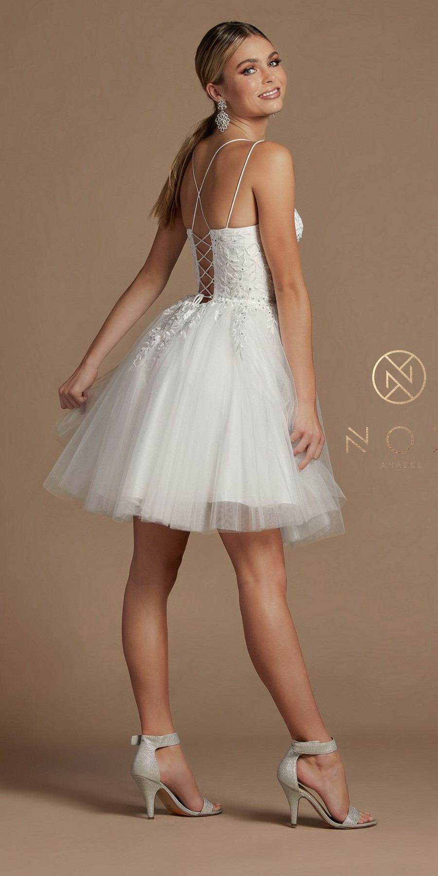 White baby doll dress with corset back, thin straps, sparkly bodice, tulle skirt