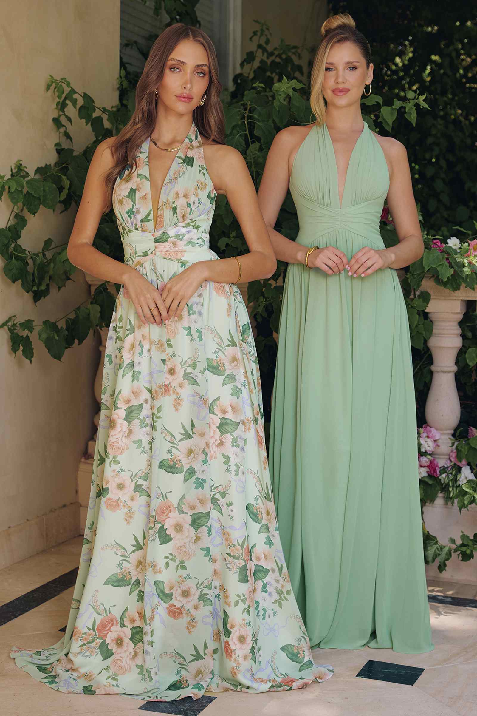 Floral A-line gown with plunging neckline, sleeveless; light base with green and pink blooms