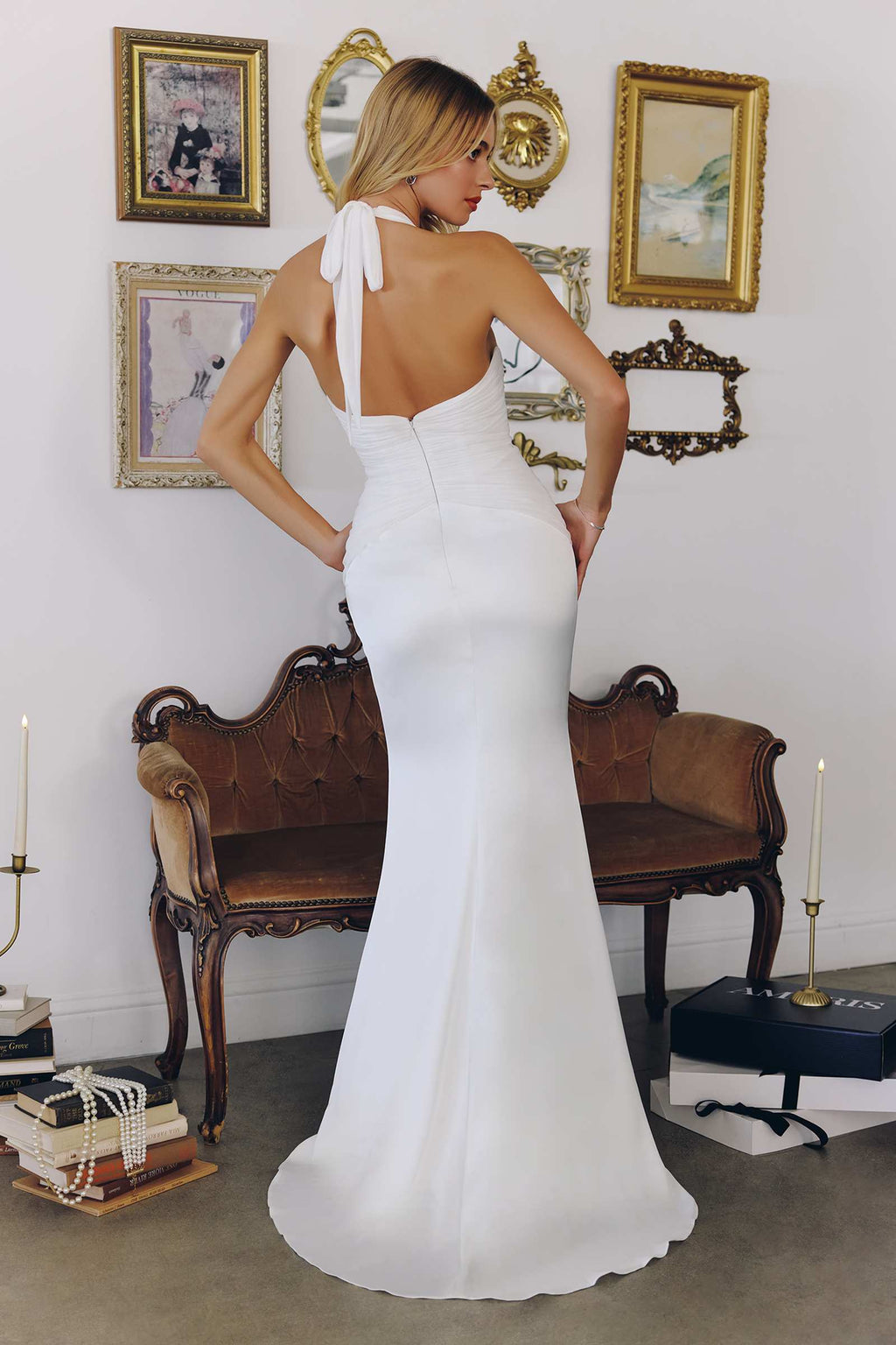 Off-white halter satin bridal gown, open back with tie straps, fitted floor-length fit