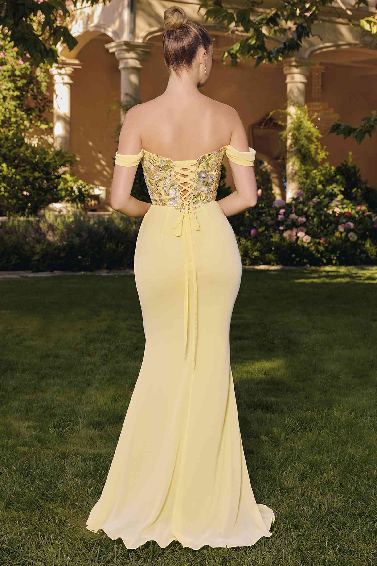 Light yellow off-shoulder mermaid gown with corset back and center draped tie