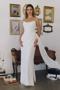 Off-white strapless bridal gown with side sash chiffon drape, full length