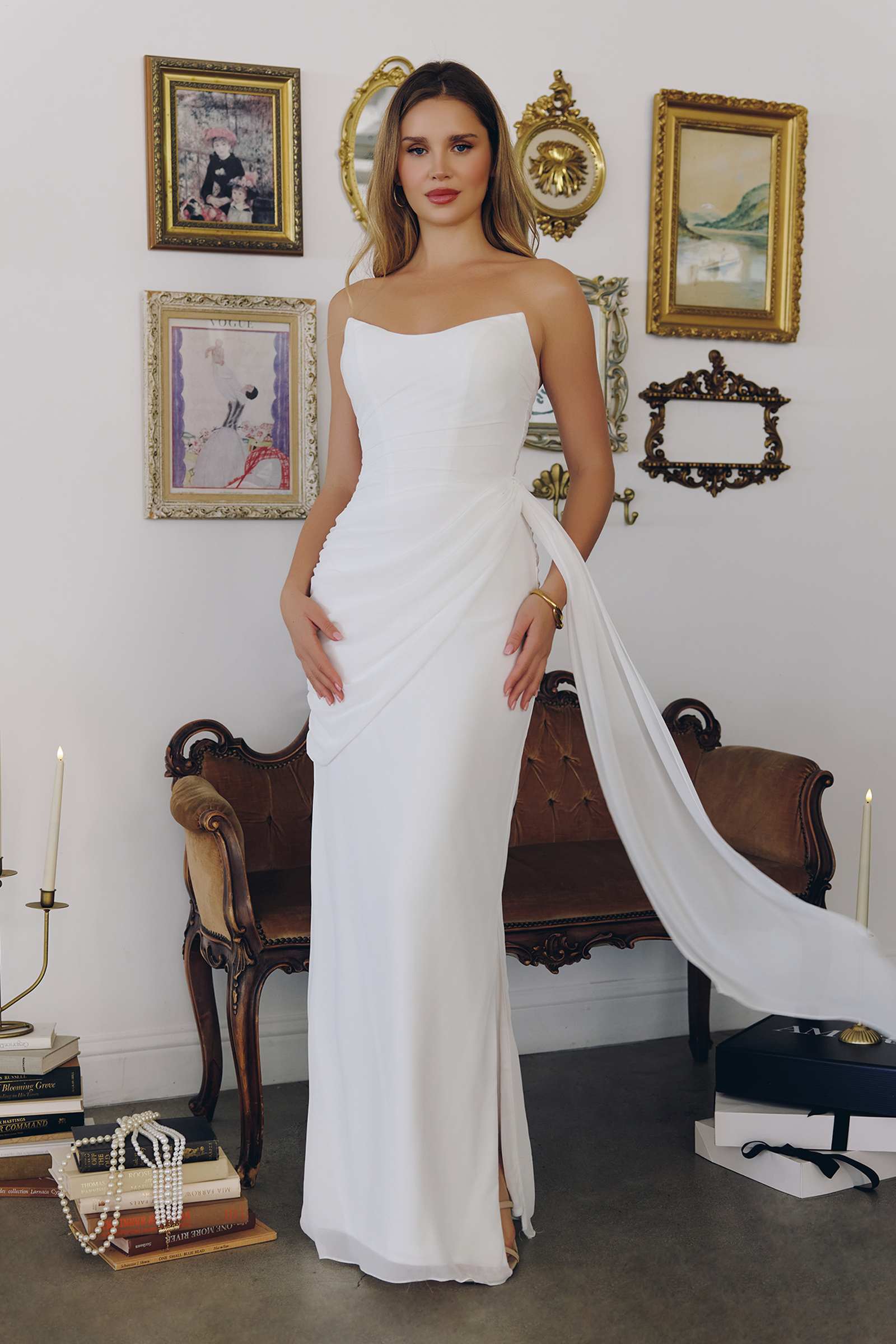 Off-white strapless bridal gown with side sash chiffon drape, full length
