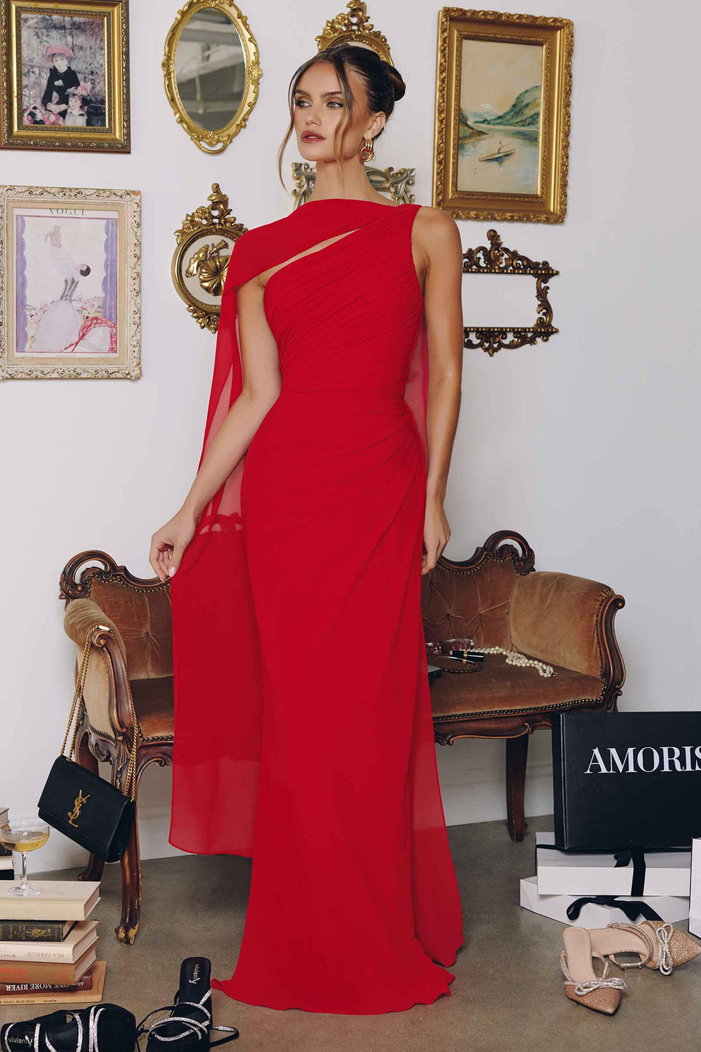 Red one-shoulder chiffon formal gown with neckline cutout and long column skirt.