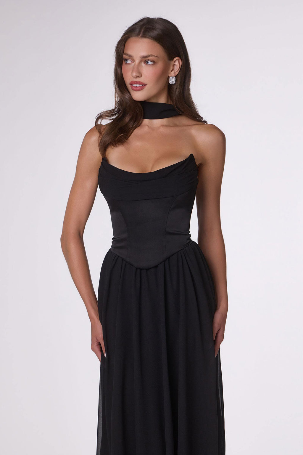 Black strapless chiffon A-line evening gown with fitted ruched bodice and gathered waist
