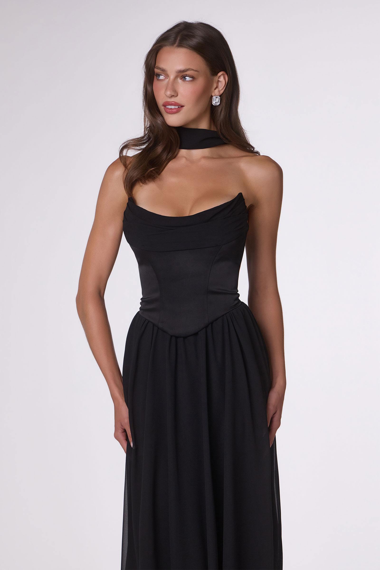 Black strapless chiffon A-line evening gown with fitted ruched bodice and gathered waist
